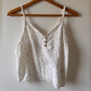 American Eagle floral tank with ruffle bottom, size large. In great condition!